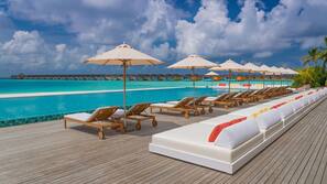 2 outdoor pools, open 10:00 AM to midnight, pool umbrellas