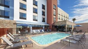 Outdoor pool, open 8:00 AM to 10:00 PM, sun loungers