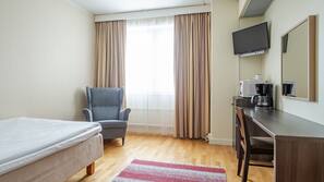 Desk, laptop workspace, blackout curtains, iron/ironing board