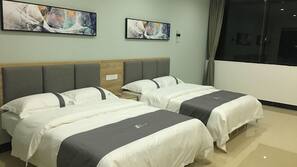 Premium bedding, pillowtop beds, desk, blackout drapes