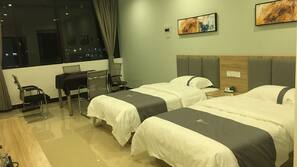 Premium bedding, pillowtop beds, desk, blackout drapes