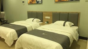Premium bedding, pillowtop beds, desk, blackout drapes