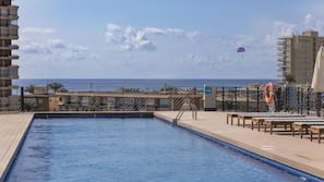 2 outdoor pools, pool umbrellas, pool loungers