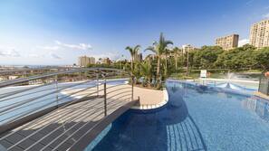 2 outdoor pools, pool umbrellas, pool loungers
