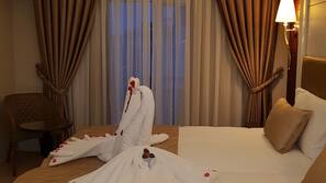 Egyptian cotton sheets, premium bedding, minibar, in-room safe
