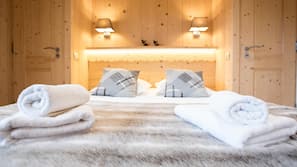 5 bedrooms, premium bedding, iron/ironing board, free cots/infant beds