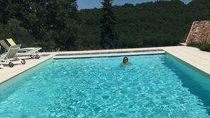 Seasonal outdoor pool, open 10:00 AM to 8:00 PM, sun loungers