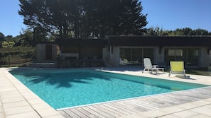 Seasonal outdoor pool, open 10:00 AM to 8:00 PM, sun loungers