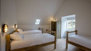 Premium bedding, blackout curtains, soundproofing, free WiFi