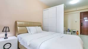 Desk, blackout curtains, free WiFi, linens