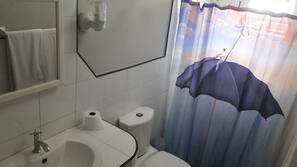 Shower, rainfall showerhead, towels