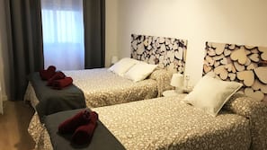 2 dormitorios, tabla de planchar con plancha, wifi gratis y ropa de cama