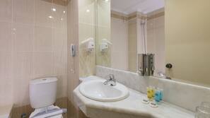 Shower, free toiletries, hair dryer, towels