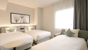 Premium bedding, down comforters, blackout drapes, free WiFi
