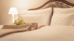 Premium bedding, down comforters, minibar, in-room safe