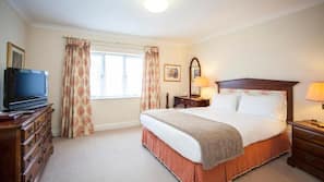Blackout curtains, iron/ironing board, free WiFi, linens