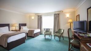 Blackout curtains, iron/ironing board, free WiFi, linens
