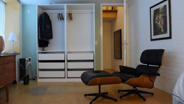 2 bedrooms, premium bedding, laptop workspace, iron/ironing board