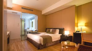 Premium bedding, down comforters, pillowtop beds, minibar