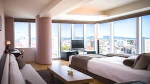 Premium bedding, down comforters, pillowtop beds, minibar