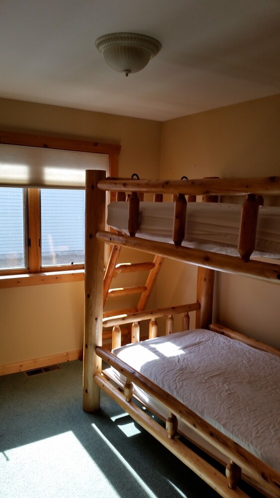 Relaxing Lake View Condo with Hot Tub and Deck, Enjoy Burt Lake Sunsets