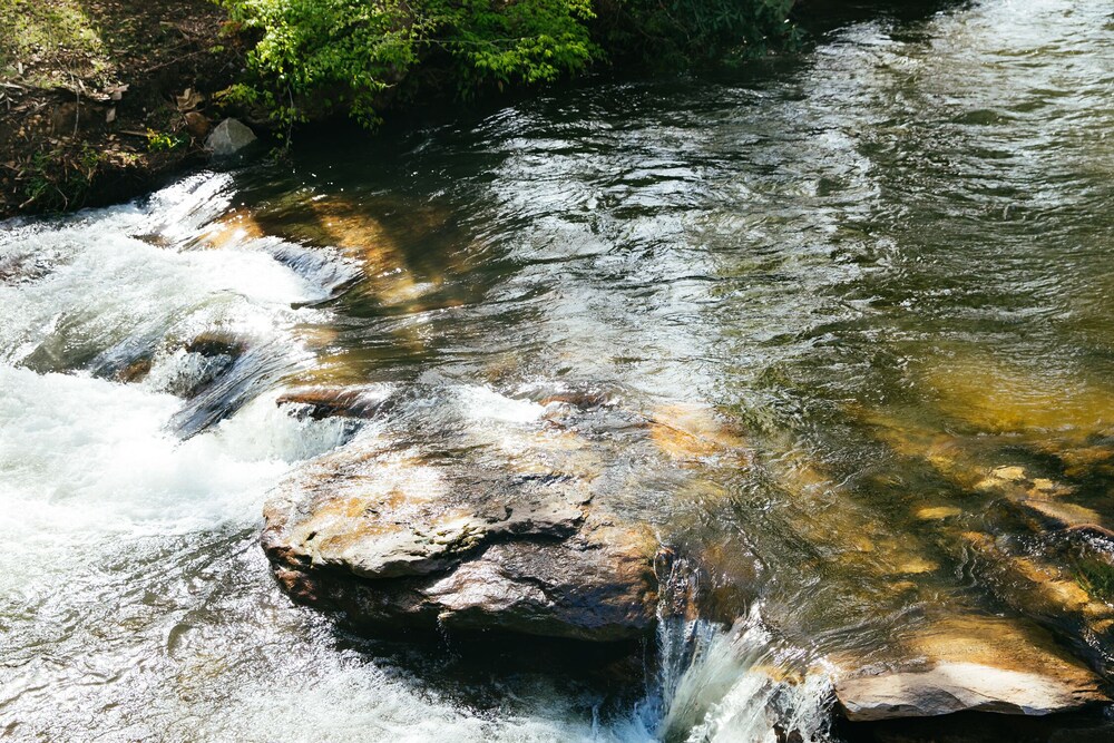 A Stunning Creekside Home, Breathtaking Waterfeatures to Enjoy from Every Window