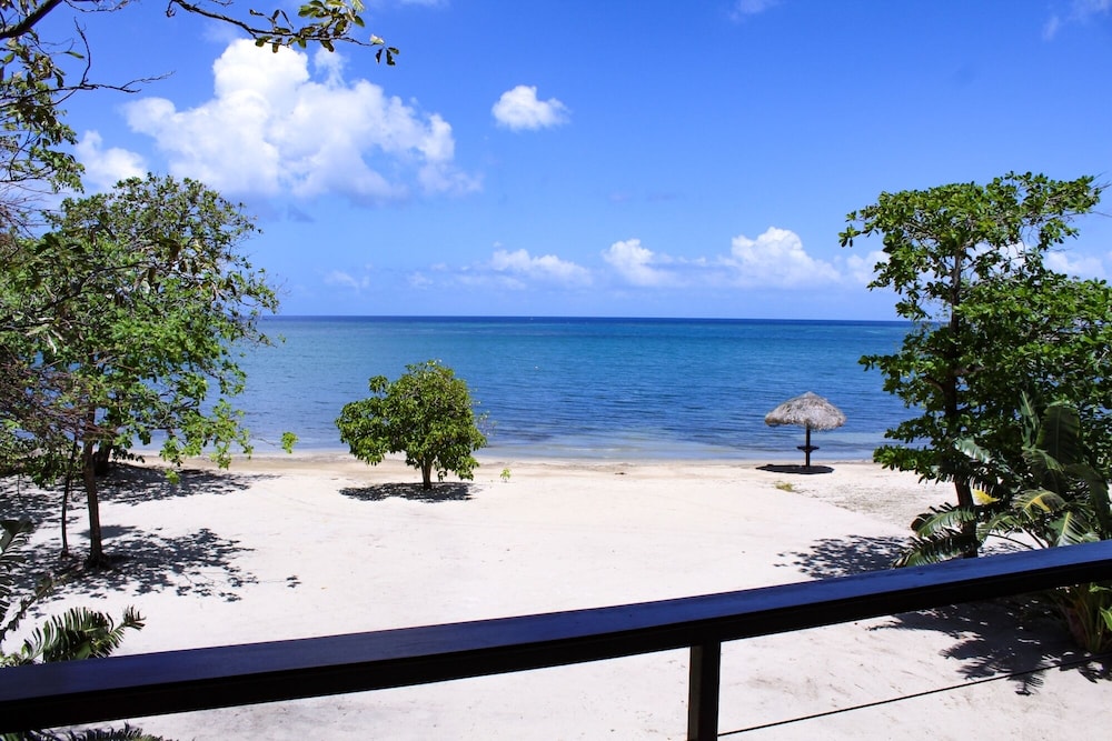 Elegant Custom Beachfront Villa With Floor To Ceiling Glass Walls