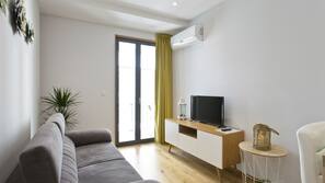 80-cm flat-screen TV with satellite channels