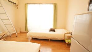 Down comforters, blackout drapes, iron/ironing board, free WiFi