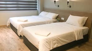 Desk, blackout curtains, free WiFi, linens