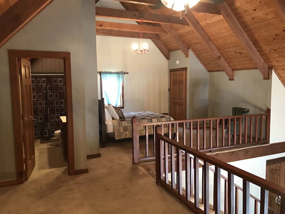 The Cabin at Flat Rock Farms rustic charm on a beautiful former horse