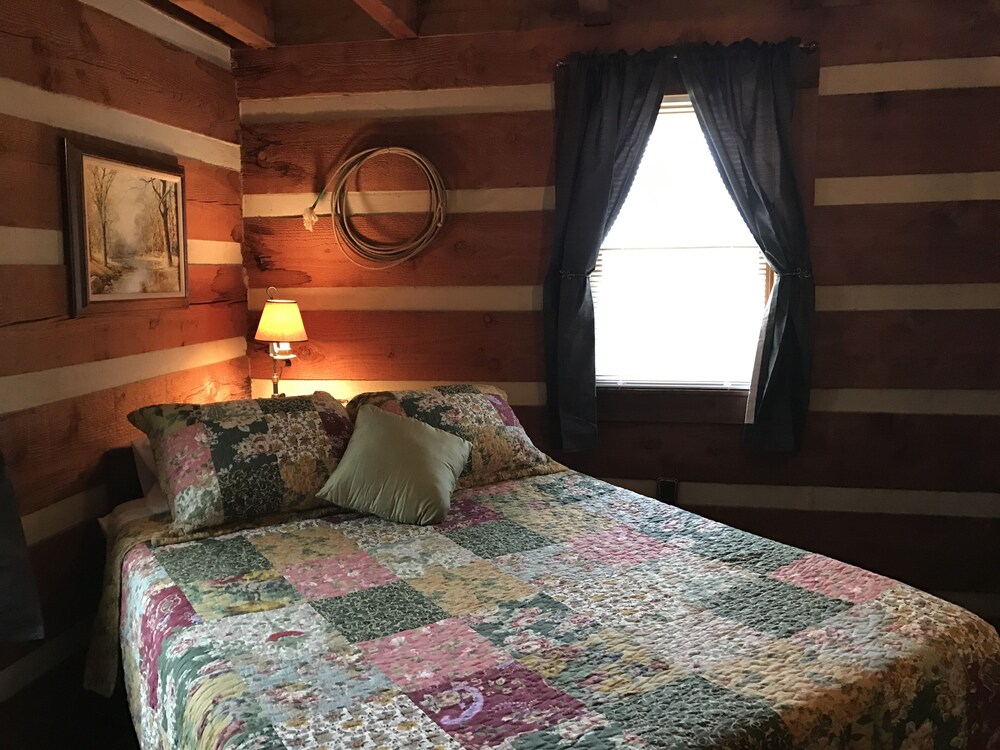 The Cabin at Flat Rock Farms rustic charm on a beautiful former horse