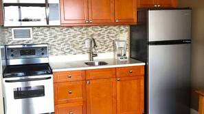 Fridge, microwave, hob, coffee/tea maker