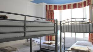 Blackout curtains, iron/ironing board, free WiFi, linens