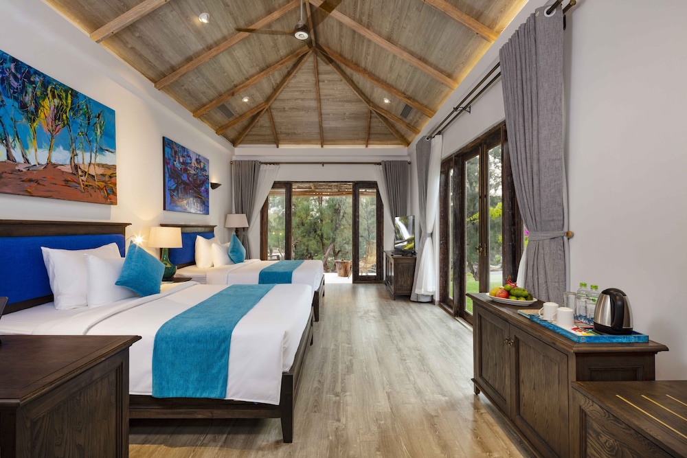 Stelia Beach Resort - hotel rooms