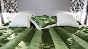 Ropa de cama de alta calidad, minibar, caja fuerte