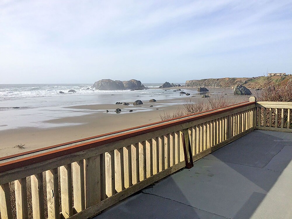 Old Rustic Beach Cabin: private deck overlooking Face Rock Beach.