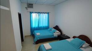 Down comforters, blackout drapes, iron/ironing board, free WiFi