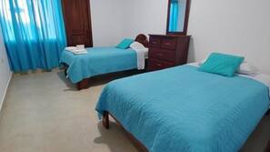 Down comforters, blackout drapes, iron/ironing board, free WiFi