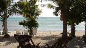 On the beach, sun loungers, beach towels