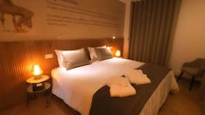 Minibar, coffre-forts dans les chambres, bureau, rideaux occultants
