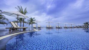 Outdoor pool, pool umbrellas, sun loungers