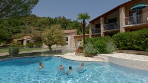 Seasonal outdoor pool, pool umbrellas, sun loungers