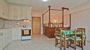 Fridge, hob, coffee/tea maker, cookware/dishes/utensils