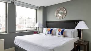 Laptop workspace, iron/ironing board, free WiFi, linens