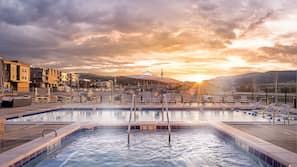 Outdoor pool, open 6:00 AM to 10:00 PM, pool umbrellas, sun loungers