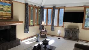 Flat-screen TV, fireplace