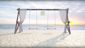 Chaises longues, serviettes de plage