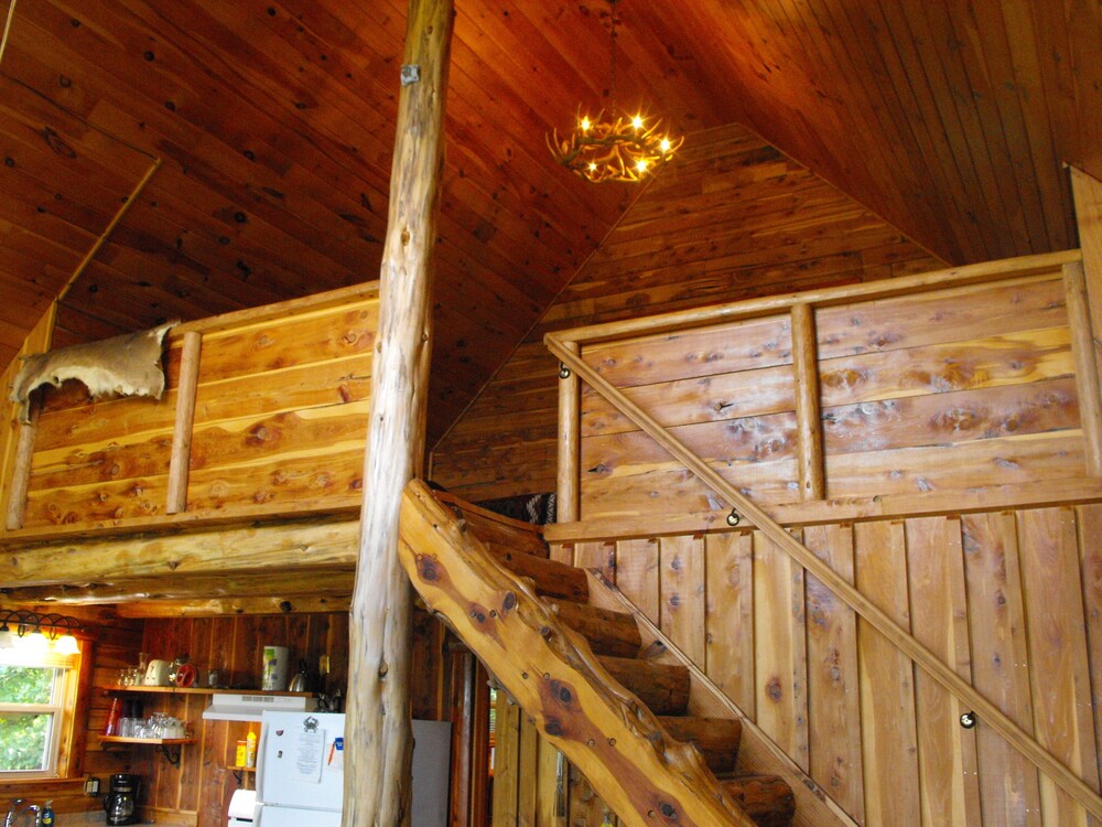 Deer Cabin Of Deer Lodge Cabin Rentals is a Secluded Ozark Cedar Log