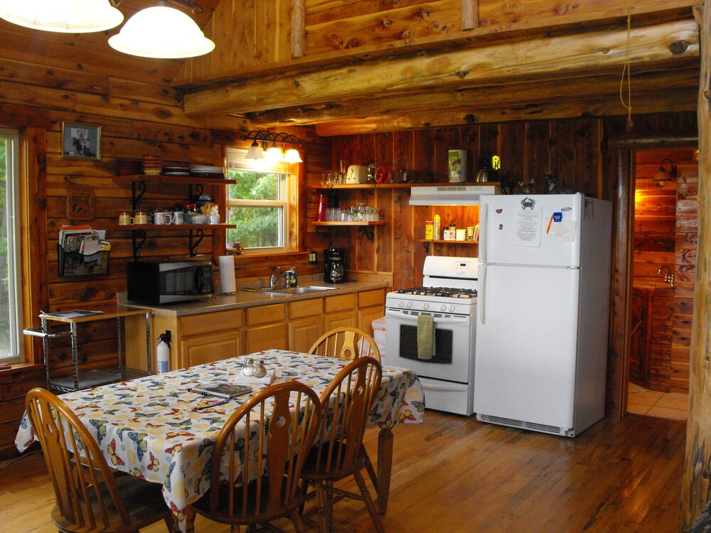 Deer Cabin Of Deer Lodge Cabin Rentals is a Secluded Ozark Cedar Log